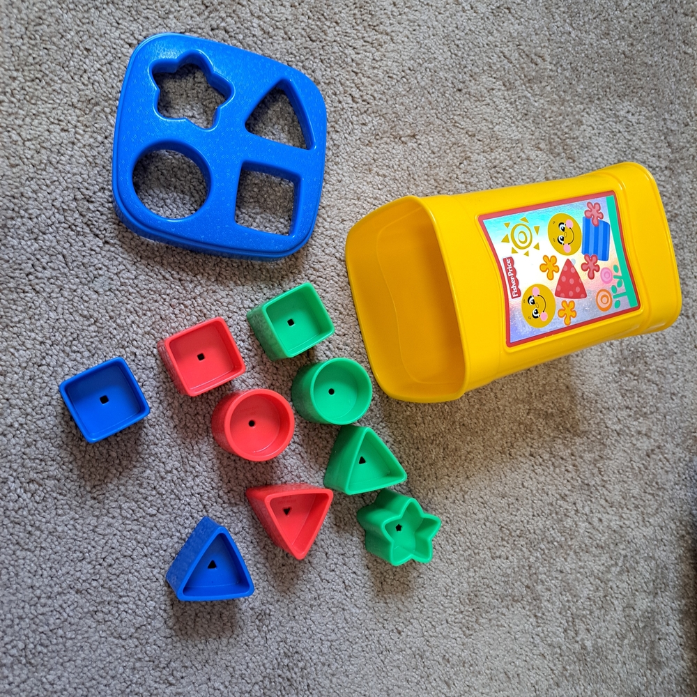 Vintage Fisher-Price Colorful Shape Sorter with Yellow Container